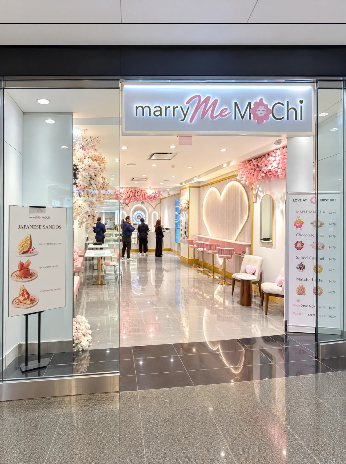 Marry Me Mochi TD Centre storefront — backlit sign, glass display case and premium retail fit-out by Atena Construction